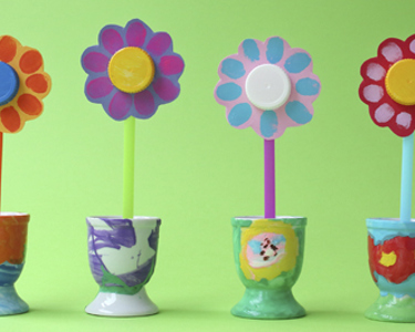 Pyssla fina blommor av korkar